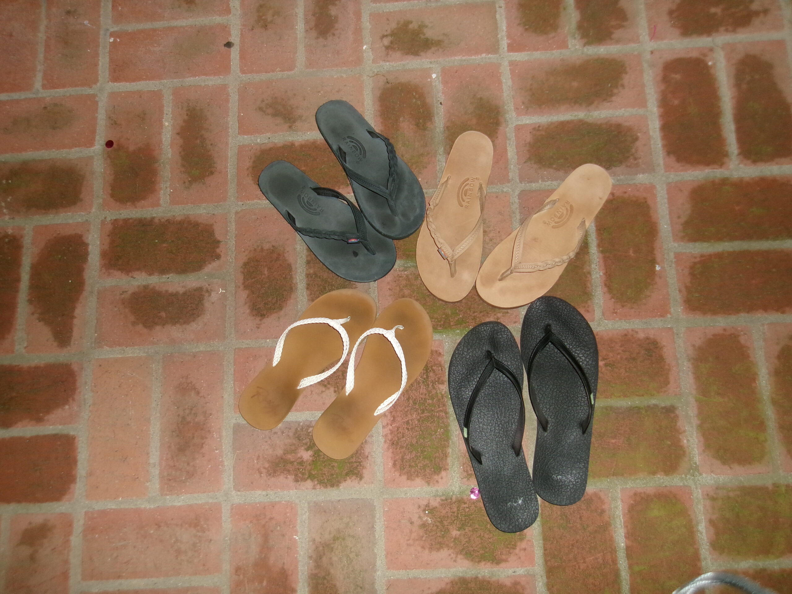 Students slip on and off flip flops